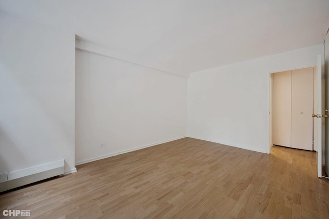 33 E Cedar St Unit 3H, Chicago, IL 60611 - empty room with light wood finished floors