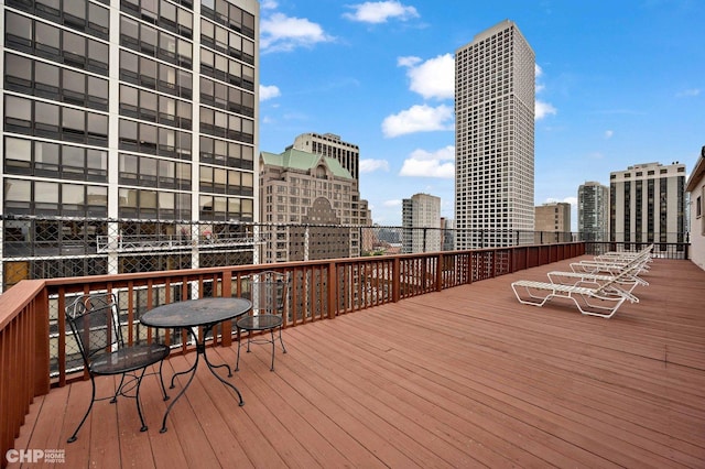 33 E Cedar St Unit 3H, Chicago, IL 60611 - deck featuring a view of city