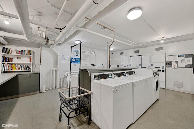 33 E Cedar St Unit 3H, Chicago, IL 60611 - shared laundry featuring independent washer and dryer and stacked washing machine and dryer