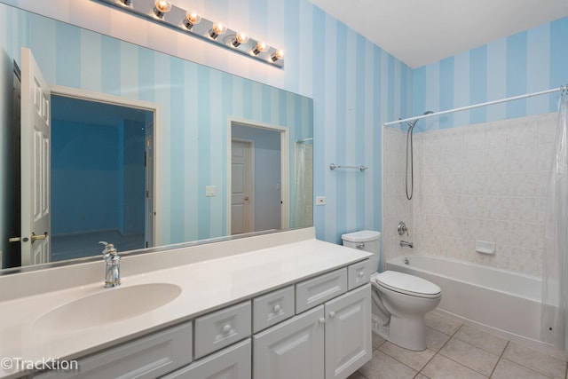 bathroom featuring toilet, shower / bathtub combination with curtain, vanity, wallpapered walls, and tile patterned floors
