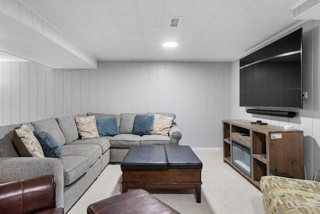 living room with carpet flooring and visible vents