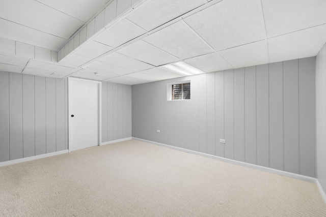 basement featuring carpet flooring