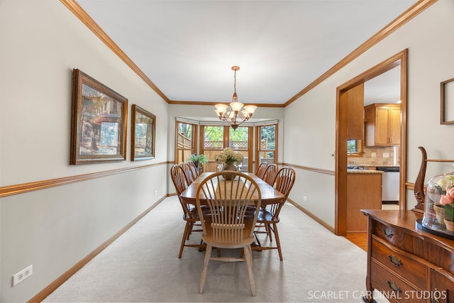 dining area featuring an inviting chandelier, baseboards, crown molding, and light carpet