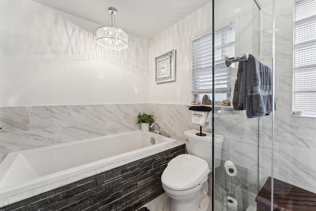 353 E Butterfield Rd, Elmhurst, IL 60126 - full bath with plenty of natural light, a bath, toilet, a chandelier, and tile walls