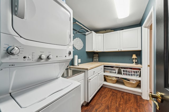 353 E Butterfield Rd, Elmhurst, IL 60126 - washroom with stacked washer / dryer, cabinet space, and dark wood-type flooring