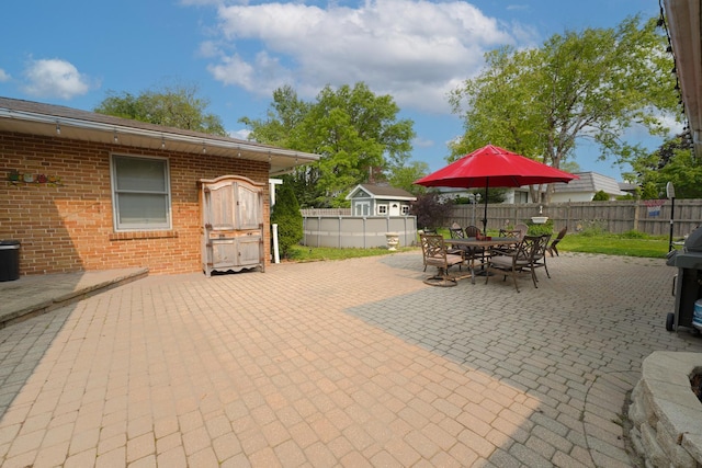 353 E Butterfield Rd, Elmhurst, IL 60126 - fenced backyard with a patio area and outdoor dining area