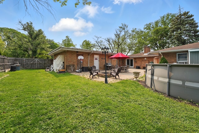 353 E Butterfield Rd, Elmhurst, IL 60126 - view of yard with a fire pit and a patio