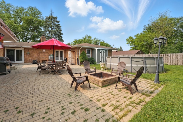 353 E Butterfield Rd, Elmhurst, IL 60126 - view of patio featuring a fire pit and area for grilling