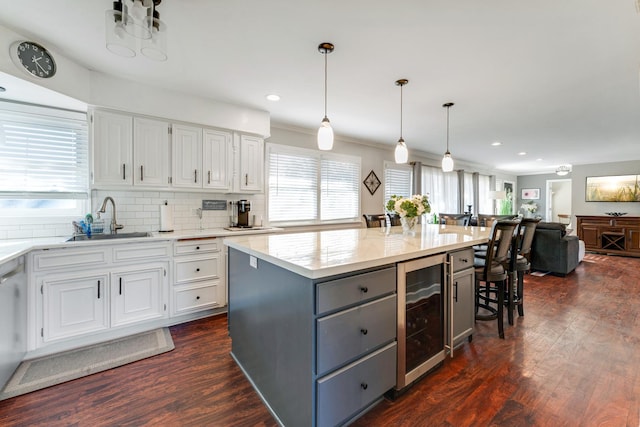 353 E Butterfield Rd, Elmhurst, IL 60126 - kitchen featuring beverage cooler, a sink, gray cabinetry, white cabinets, and dark wood-style floors