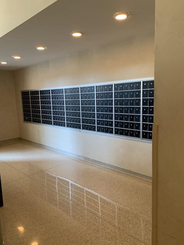 details featuring mail area and recessed lighting