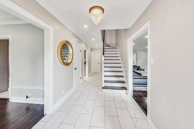 5801 N Drake Ave, Chicago, IL 60659 - foyer featuring baseboards, a chandelier, recessed lighting, stairs, and marble finish floor