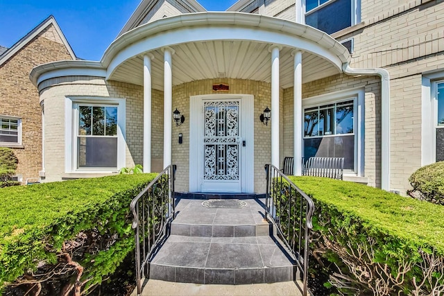 5801 N Drake Ave, Chicago, IL 60659 - entrance to property featuring a porch and brick siding
