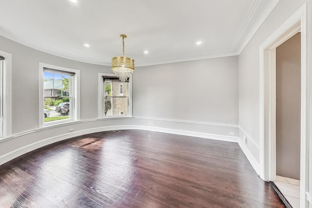 5801 N Drake Ave, Chicago, IL 60659 - empty room with dark wood-type flooring, an inviting chandelier, ornamental molding, and recessed lighting