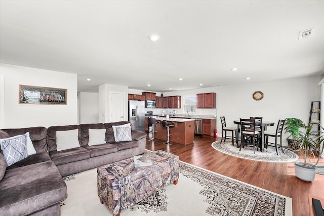 2834 Ketchum Ct, Yorkville, IL 60560 - living area with recessed lighting, dark wood-style flooring, and visible vents