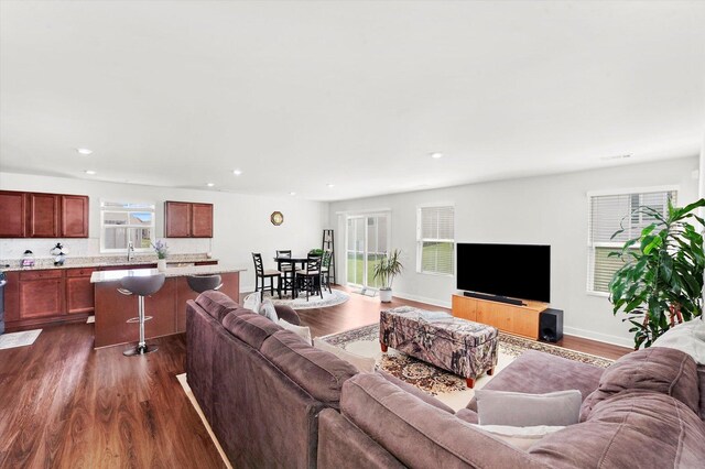 2834 Ketchum Ct, Yorkville, IL 60560 - living room with dark wood-type flooring, baseboards, and recessed lighting