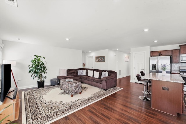 2834 Ketchum Ct, Yorkville, IL 60560 - living room featuring recessed lighting, dark wood-type flooring, visible vents, and baseboards