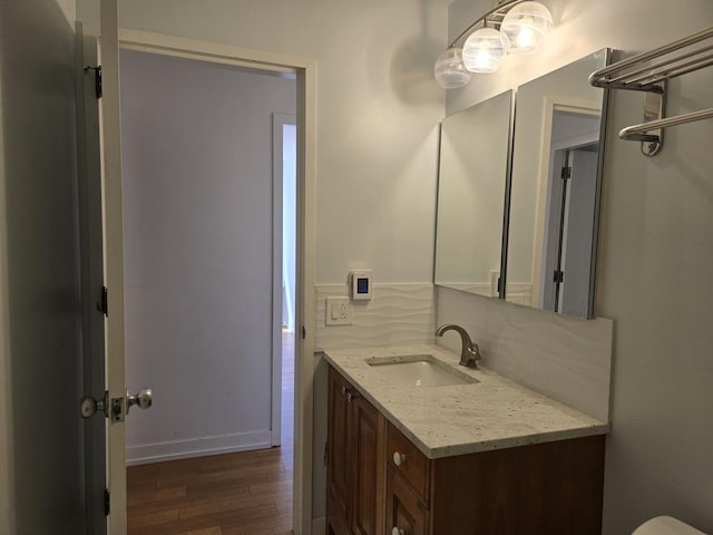 1115 S Plymouth Ct Unit 303, Chicago, IL 60605 - bathroom featuring tasteful backsplash, vanity, baseboards, and wood finished floors