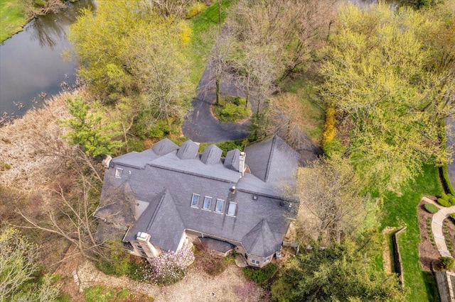birds eye view of property featuring a water view