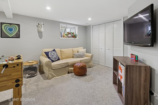 living room with recessed lighting and carpet floors
