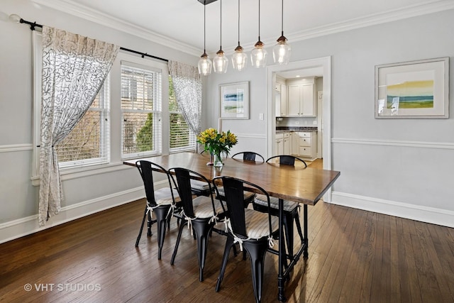 dining area with baseboards, ornamental molding, and dark wood-style flooring