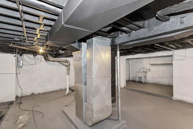 unfinished basement with heating unit