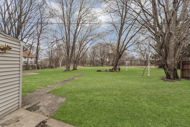 view of yard with fence