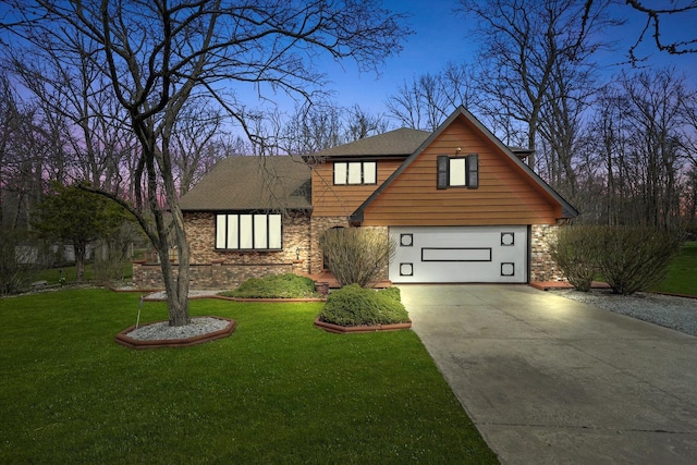 view of front facade featuring a front yard, a garage, brick siding, driveway, and roof with shingles
