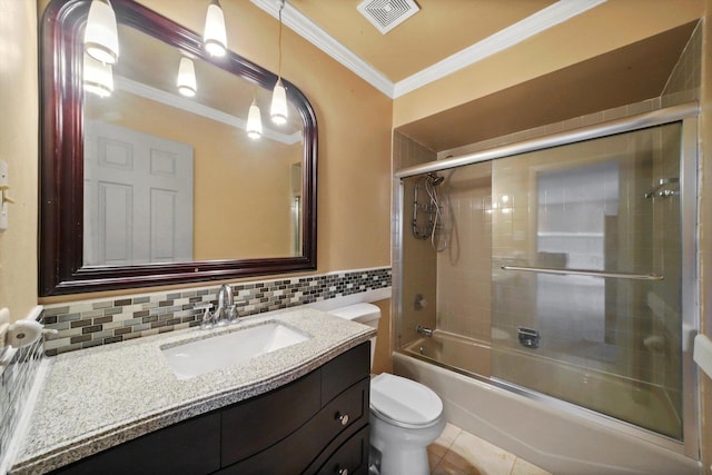 full bathroom featuring vanity, ornamental molding, visible vents, toilet, and tile patterned floors