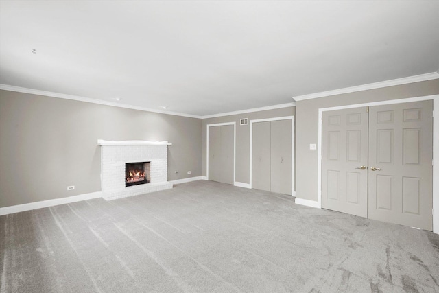 unfurnished living room featuring a fireplace, ornamental molding, and baseboards