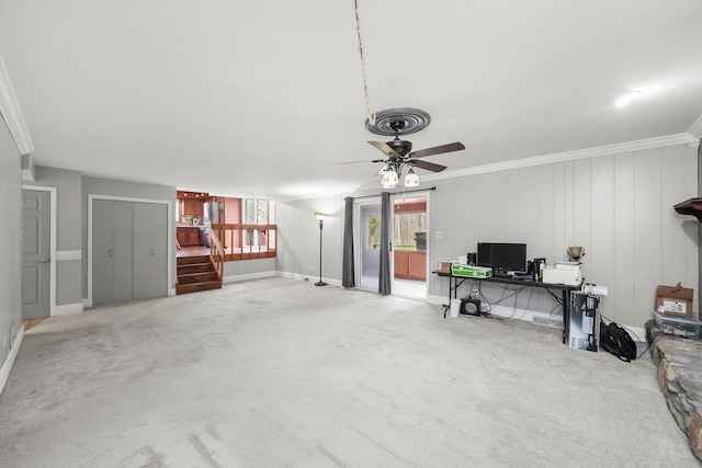 carpeted home office featuring visible vents, ornamental molding, ceiling fan, and baseboards