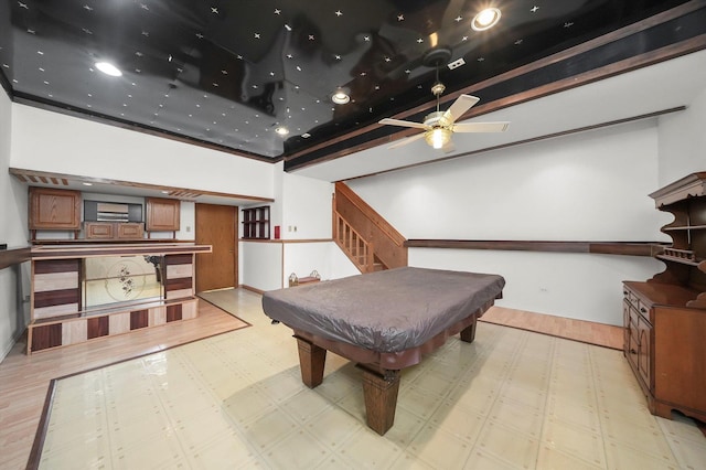 playroom with pool table, light floors, and ceiling fan