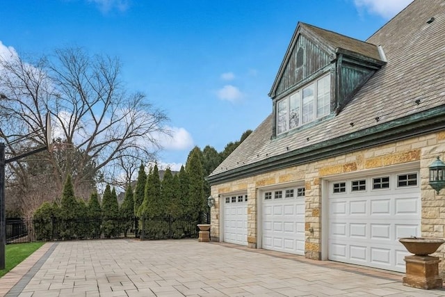 garage featuring driveway