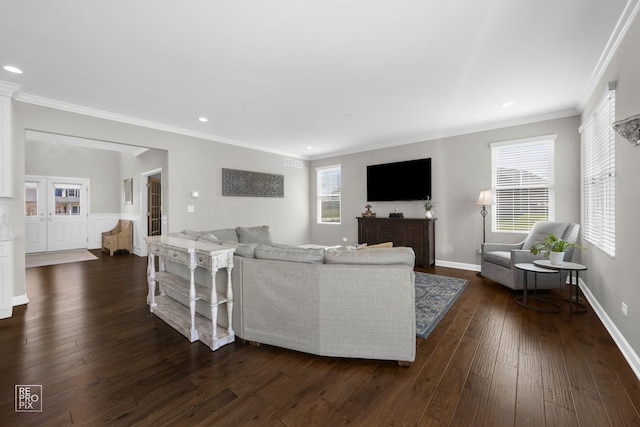 living room featuring recessed lighting, dark wood-style flooring, visible vents, and ornamental molding