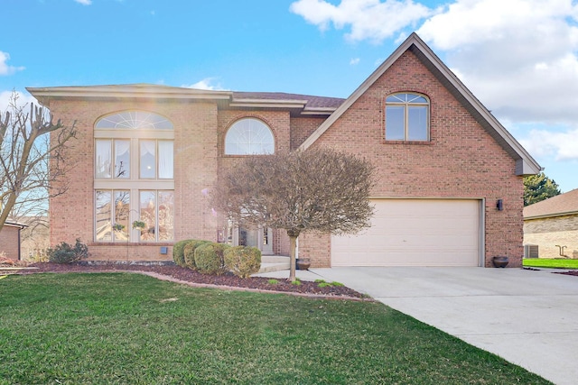 14232 Selva Ln, Orland Park, IL 60462 - view of front facade featuring a garage, concrete driveway, brick siding, and a front lawn