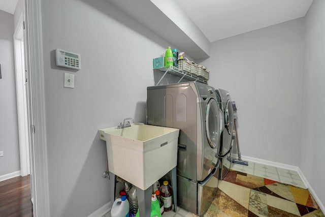 14232 Selva Ln, Orland Park, IL 60462 - clothes washing area with separate washer and dryer and baseboards