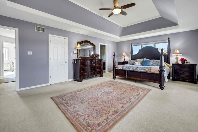 14232 Selva Ln, Orland Park, IL 60462 - carpeted bedroom featuring baseboards, a tray ceiling, and ceiling fan