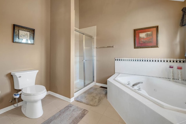 14232 Selva Ln, Orland Park, IL 60462 - bathroom featuring a shower stall, toilet, a whirlpool tub, baseboards, and tile patterned flooring
