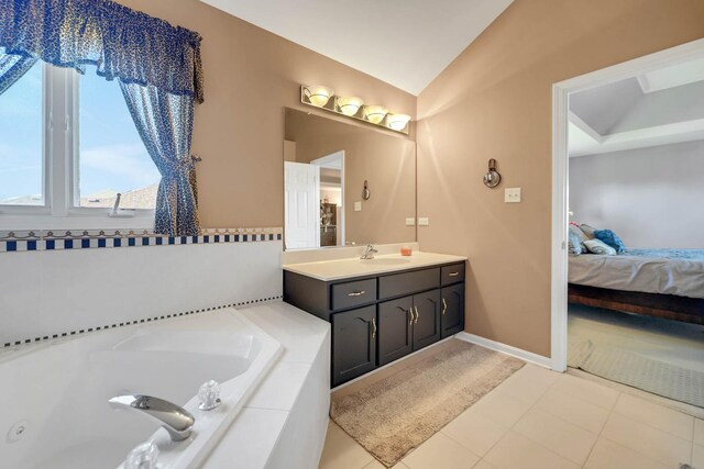 14232 Selva Ln, Orland Park, IL 60462 - ensuite bathroom with a bath, vanity, vaulted ceiling, and baseboards