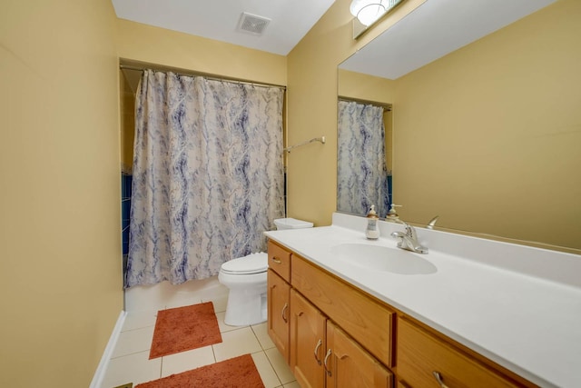 14232 Selva Ln, Orland Park, IL 60462 - full bath featuring tile patterned floors, toilet, vanity, a shower with curtain, and baseboards
