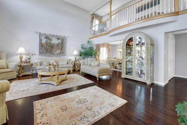 14232 Selva Ln, Orland Park, IL 60462 - living room with a high ceiling, wood finished floors, and baseboards
