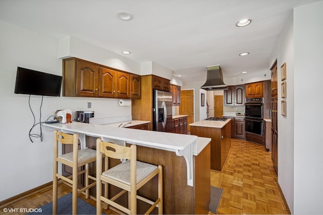 1704 Executive Ln, Glenview, IL 60026 - kitchen featuring stainless steel appliances, island range hood, a peninsula, a kitchen island, and recessed lighting