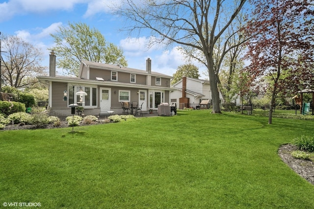 1704 Executive Ln, Glenview, IL 60026 - back of property with a chimney and a patio area