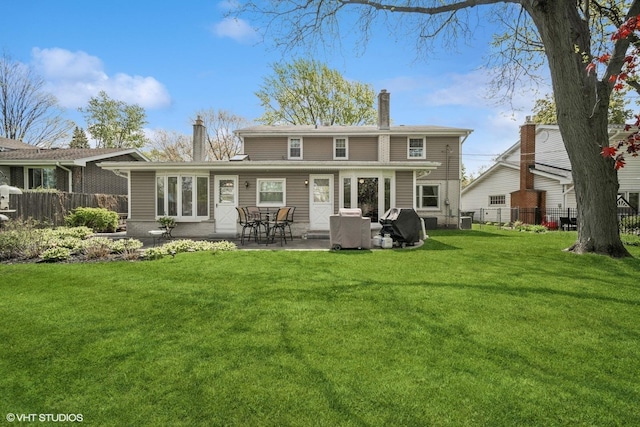 1704 Executive Ln, Glenview, IL 60026 - rear view of property featuring a chimney and a patio area