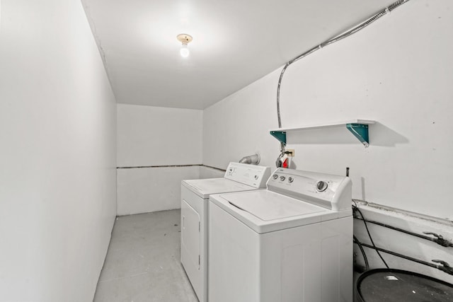 washroom with laundry area and separate washer and dryer