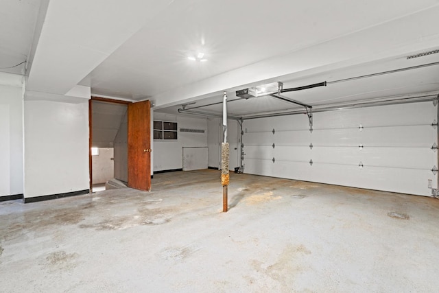 garage featuring a garage door opener