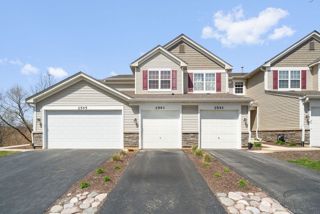 2543 Oneida Ln, Naperville, IL 60563 - view of property featuring driveway and stone siding