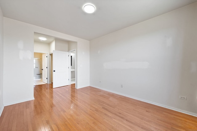 2543 Oneida Ln, Naperville, IL 60563 - spare room featuring baseboards and light wood finished floors