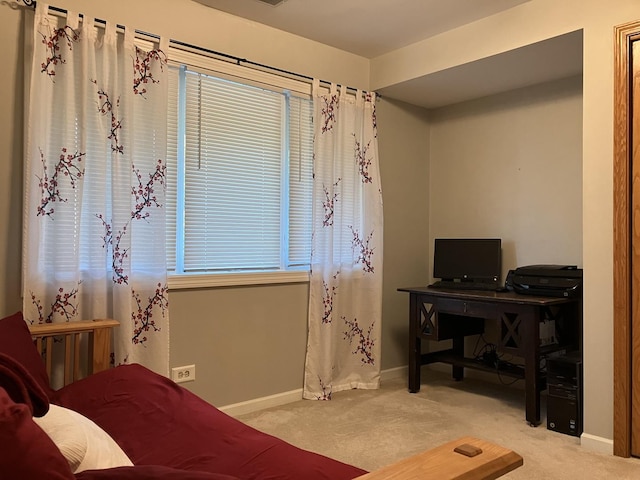 bedroom featuring carpet flooring and baseboards