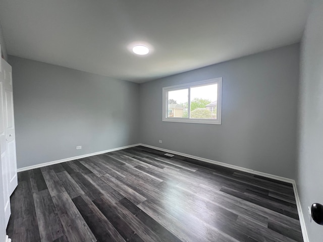1170 Singleton Dr, Roselle, IL 60172 - unfurnished room featuring dark wood finished floors and baseboards