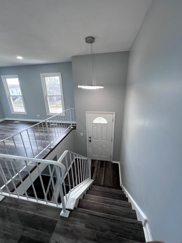 1170 Singleton Dr, Roselle, IL 60172 - stairway featuring wood finished floors and baseboards